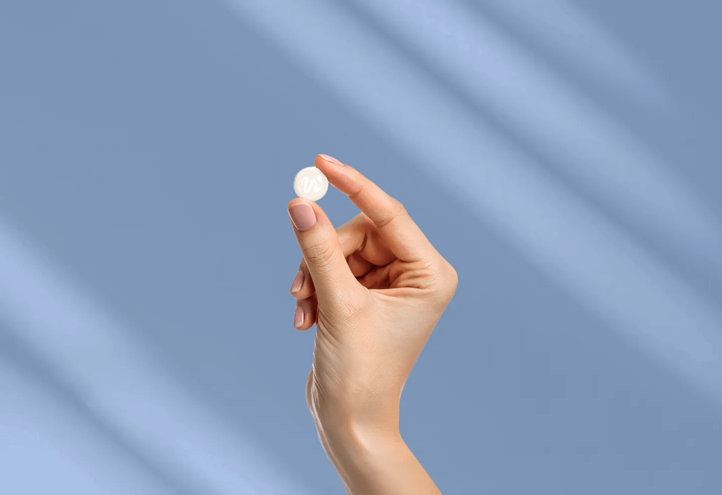Medication packaging and a glass of water