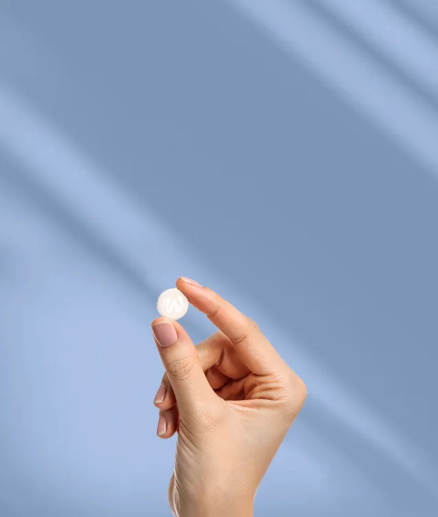 Medication packaging and a glass of water