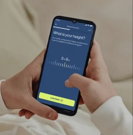 MEDVANi member holding a prescription bottle